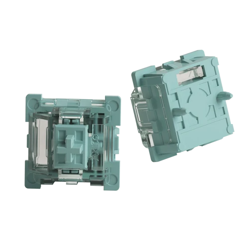 Two light teal mechanical keyboard switches shown from different angles on a plain white background.