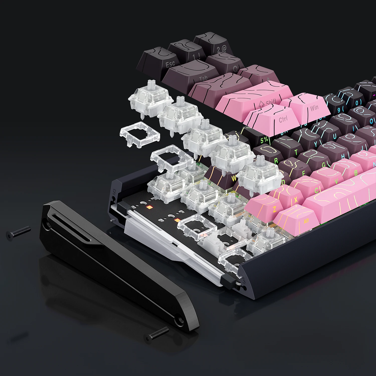 An exploded view of a mechanical keyboard showing the keycap arrangement, switch modules, and a detached black palm rest on a dark reflective surface.