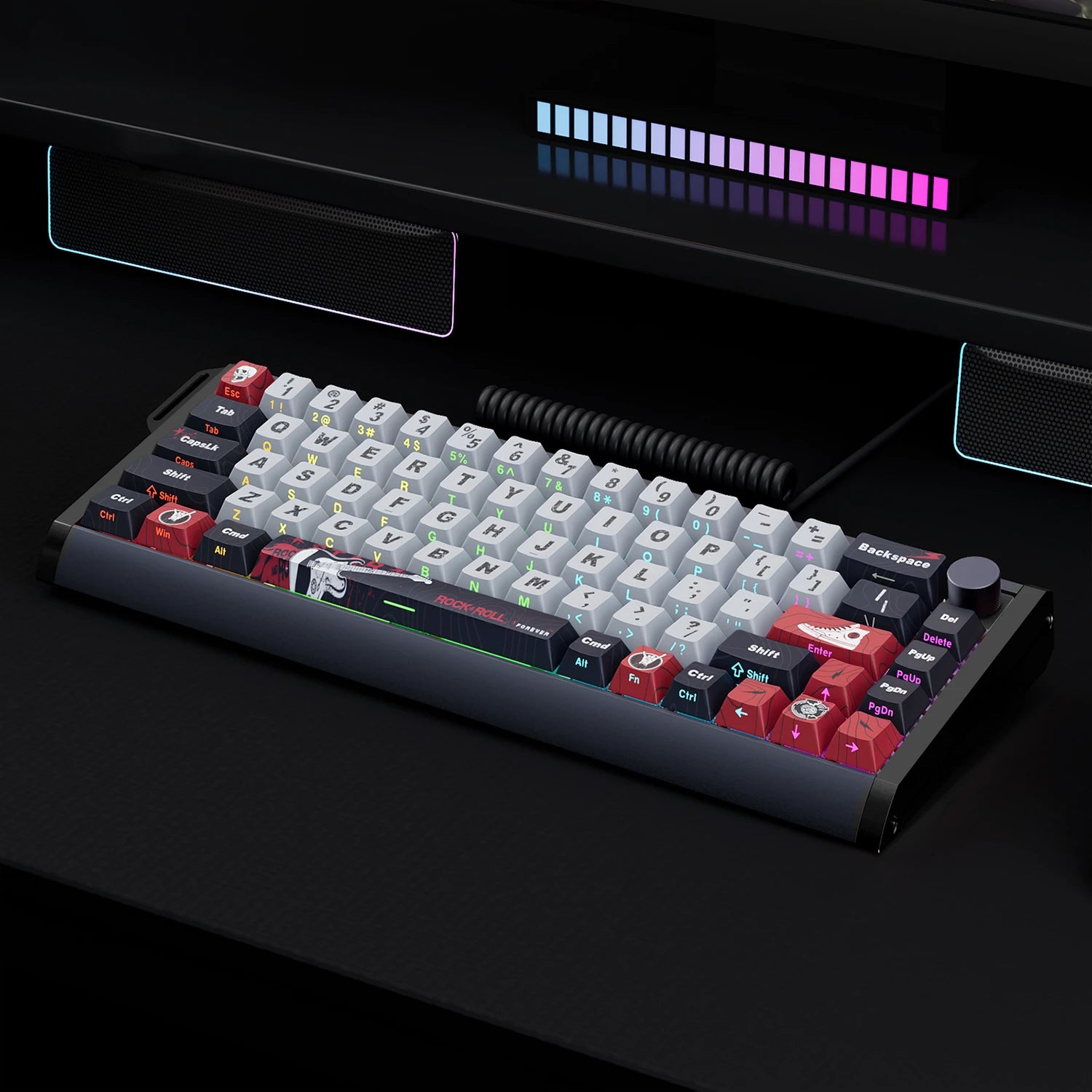 A mechanical keyboard with a white keycap layout, red and black accent keycaps, and a black chassis, shown on a dark desk under a monitor with RGB lighting.