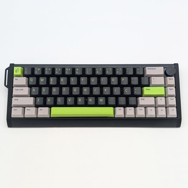 Mechanical keyboard with green and gray keys on a white background