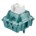 A mechanical keyboard switch keycap assembly with a translucent teal-green case and a white top plate, shown on a plain white background.