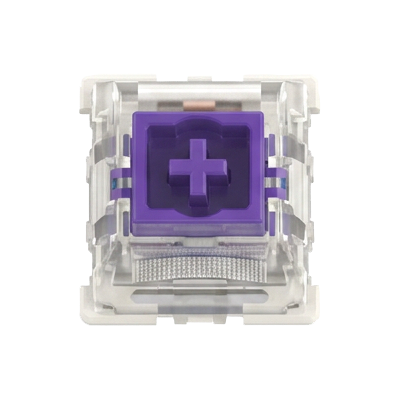 A single mechanical keyboard switch shown from above on a plain white background. The switch features a prominent purple top plate with a white cross symbol in the center, surrounded by a clear transparent case.