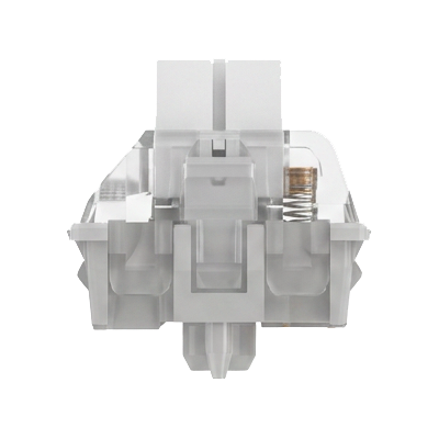 A close-up of a transparent and light gray mechanical keyboard switch module, showing internal components like a spring and contacts, isolated on a white background.