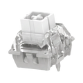 A translucent white mechanical keyboard switch module with a white top plate and internal gray and silver components, shown on a plain white background.